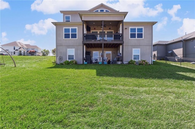 1401 Spurlock Cv, Raymore, MO 64083 - back of house featuring ceiling fan