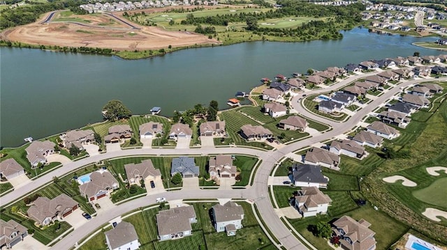 1401 Spurlock Cv, Raymore, MO 64083 - aerial view of property's location with nearby suburban area