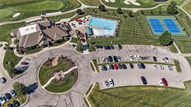 1401 Spurlock Cv, Raymore, MO 64083 - aerial overview of property's location featuring a local golf course