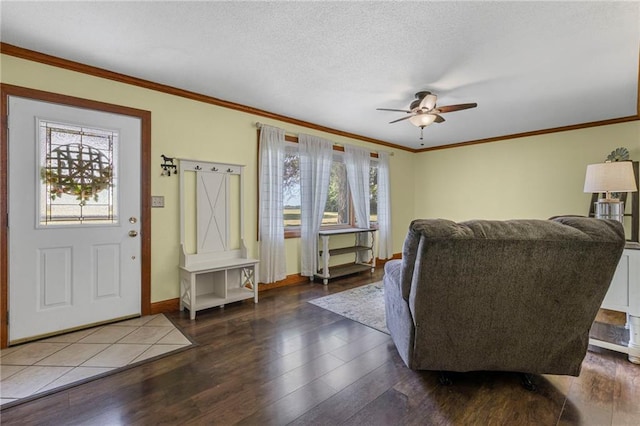 20212 S Carriage Ln, Peculiar, MO 64078 - living room featuring wood finished floors, a ceiling fan, ornamental molding, and a textured ceiling