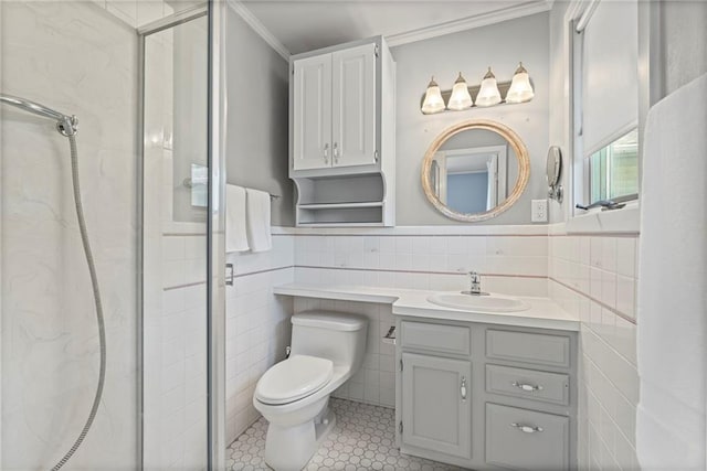 20212 S Carriage Ln, Peculiar, MO 64078 - bathroom featuring tile walls, a shower stall, vanity, crown molding, and a wainscoted wall