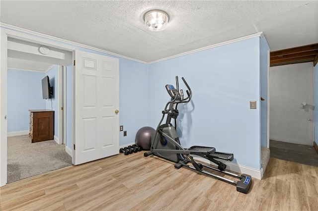 20212 S Carriage Ln, Peculiar, MO 64078 - exercise area with wood finished floors and a textured ceiling