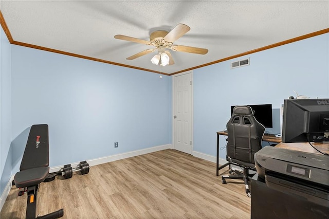 20212 S Carriage Ln, Peculiar, MO 64078 - home office with ornamental molding, ceiling fan, light wood finished floors, and a textured ceiling