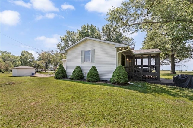20212 S Carriage Ln, Peculiar, MO 64078 - view of side of property featuring a sunroom and a yard