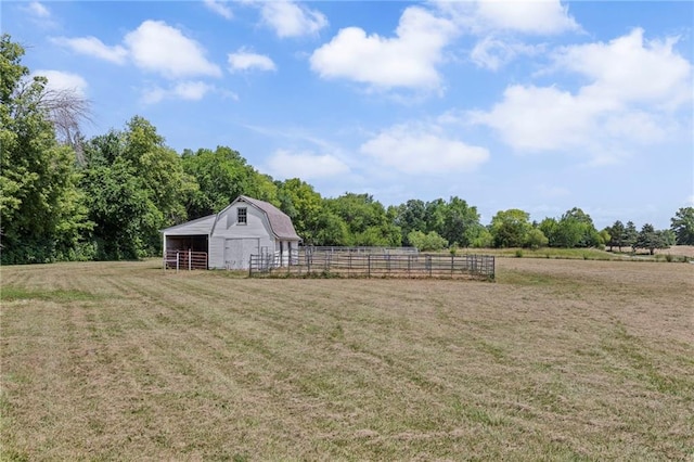 20212 S Carriage Ln, Peculiar, MO 64078 - view of yard with an outdoor structure, a barn, a view of countryside, and an exterior structure