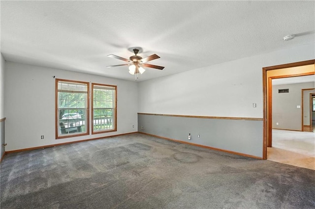 802 S Morgan Dr, Peculiar, MO 64078 - carpeted empty room with ceiling fan, a smoke detector, and a textured ceiling