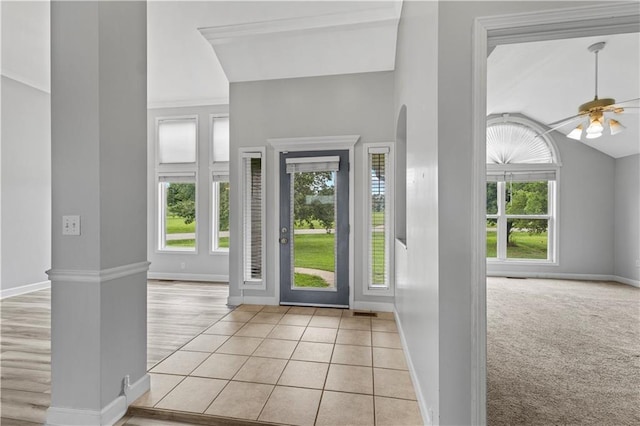 13785 E Nelson Rd, Nevada, MO 64772 - entryway with ceiling fan, vaulted ceiling, and tile patterned floors