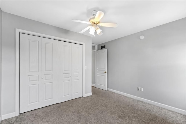 13785 E Nelson Rd, Nevada, MO 64772 - unfurnished bedroom featuring carpet floors, a closet, and ceiling fan