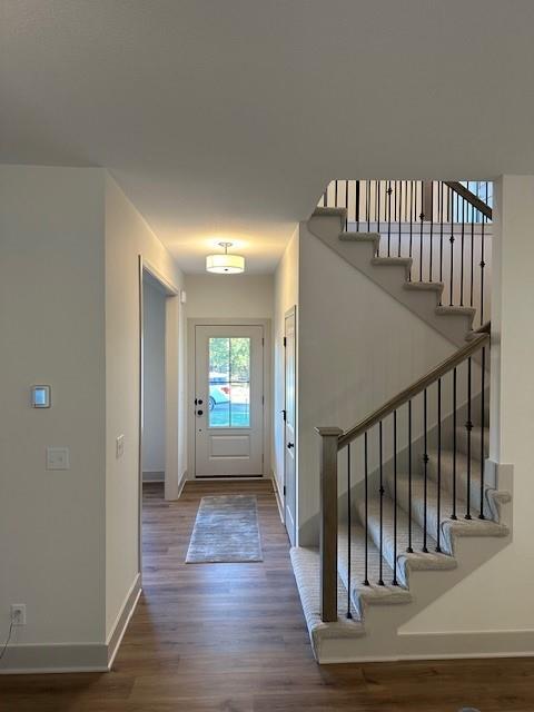 1309 N 4th St E, Louisburg, KS 66053 - entrance foyer with wood finished floors and stairway
