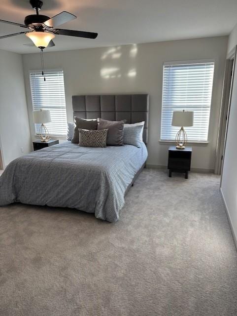 1309 N 4th St E, Louisburg, KS 66053 - bedroom featuring light carpet and ceiling fan