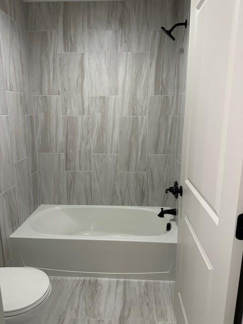 1309 N 4th St E, Louisburg, KS 66053 - full bath with toilet and shower / bathtub combination
