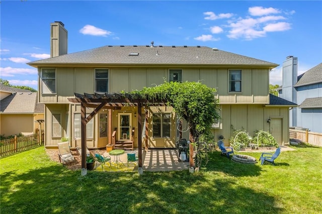 2621 SE 5th St, Lees Summit, MO 64063 - back of property with a pergola, a chimney, a fenced backyard, a patio area, and a fire pit