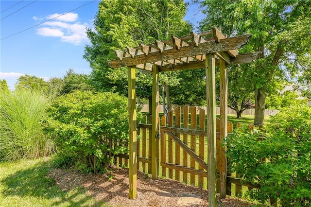2621 SE 5th St, Lees Summit, MO 64063 - view of outdoor structure with a gate and a pergola