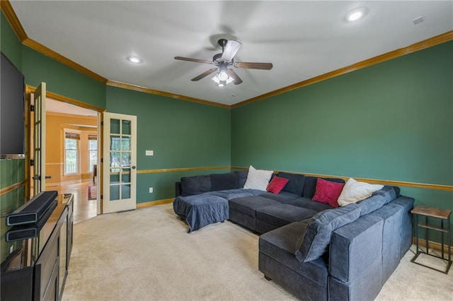 2621 SE 5th St, Lees Summit, MO 64063 - carpeted living area with french doors, crown molding, ceiling fan, and recessed lighting