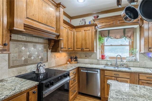 2621 SE 5th St, Lees Summit, MO 64063 - kitchen with dishwasher, electric range, brown cabinets, crown molding, and decorative backsplash