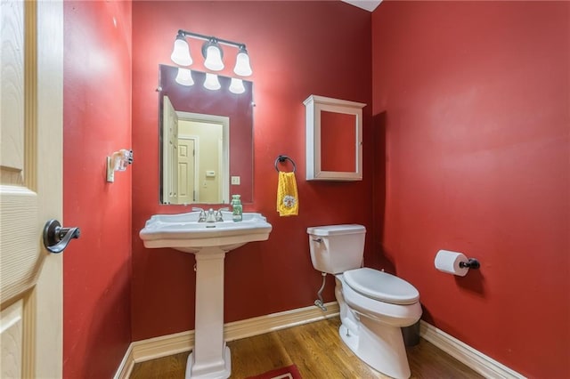 2621 SE 5th St, Lees Summit, MO 64063 - bathroom with toilet and wood finished floors