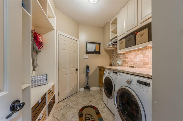 2621 SE 5th St, Lees Summit, MO 64063 - laundry room featuring washer and dryer and light tile patterned floors