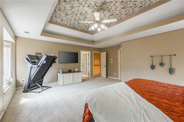 2621 SE 5th St, Lees Summit, MO 64063 - bedroom with a raised ceiling, carpet floors, and ceiling fan