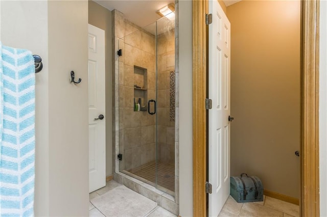 2621 SE 5th St, Lees Summit, MO 64063 - full bathroom with tile patterned flooring and a shower stall