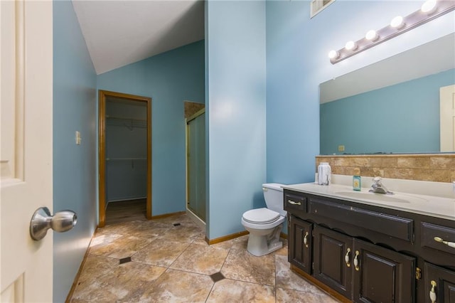 2621 SE 5th St, Lees Summit, MO 64063 - full bath with vaulted ceiling, vanity, a stall shower, and a walk in closet