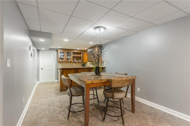 2621 SE 5th St, Lees Summit, MO 64063 - dining area featuring light tile patterned floors, bar, recessed lighting, and a drop ceiling