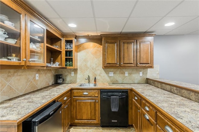 2621 SE 5th St, Lees Summit, MO 64063 - kitchen featuring black dishwasher, brown cabinetry, backsplash, a paneled ceiling, and glass insert cabinets