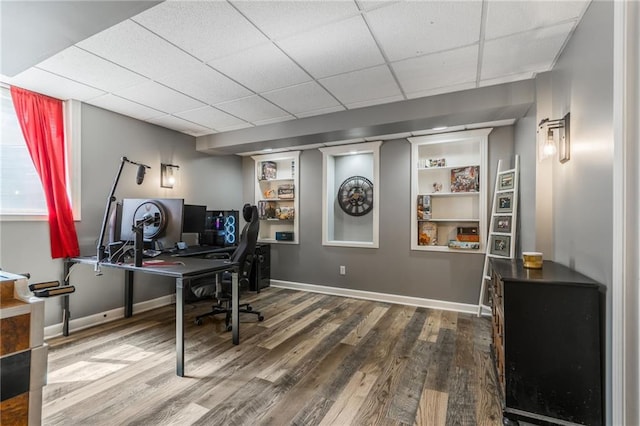 2621 SE 5th St, Lees Summit, MO 64063 - office featuring wood finished floors, a paneled ceiling, and built in shelves
