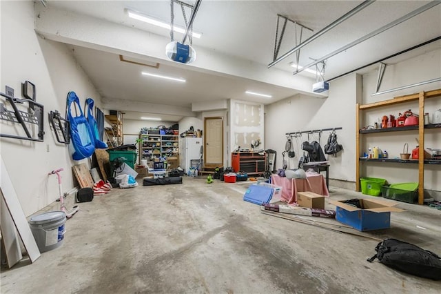 2621 SE 5th St, Lees Summit, MO 64063 - garage featuring a garage door opener