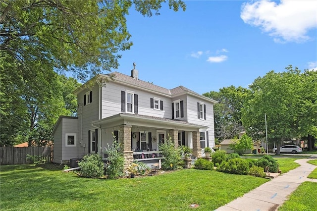 314 E Nichols St, Spring Hill, KS 66083 - view of front facade with a porch and a chimney
