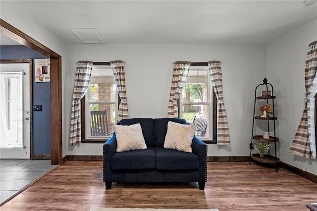 314 E Nichols St, Spring Hill, KS 66083 - living area featuring wood finished floors and attic access