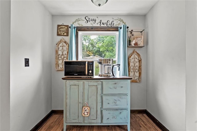 314 E Nichols St, Spring Hill, KS 66083 - detailed view of wood finished floors and baseboards