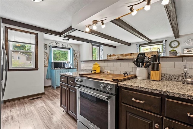 314 E Nichols St, Spring Hill, KS 66083 - kitchen featuring high end range, dark brown cabinets, beamed ceiling, decorative backsplash, and open shelves