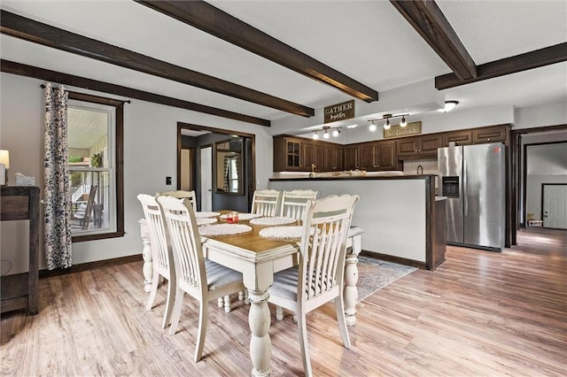 314 E Nichols St, Spring Hill, KS 66083 - dining area featuring light wood-style floors and beamed ceiling