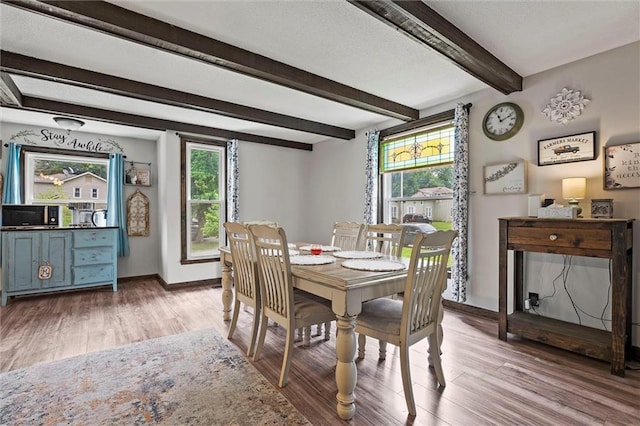 314 E Nichols St, Spring Hill, KS 66083 - dining area featuring light wood-style floors and beamed ceiling