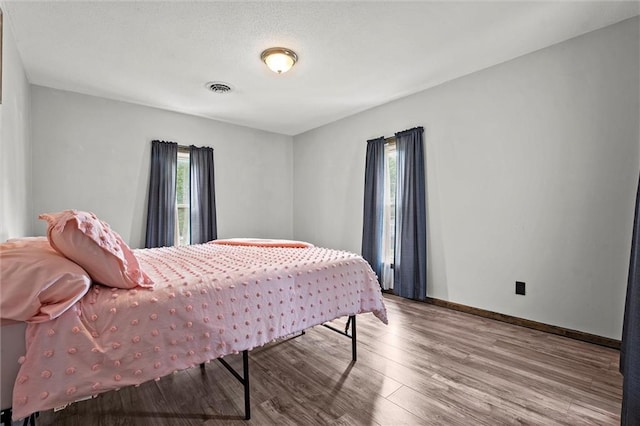 314 E Nichols St, Spring Hill, KS 66083 - bedroom with wood finished floors and baseboards