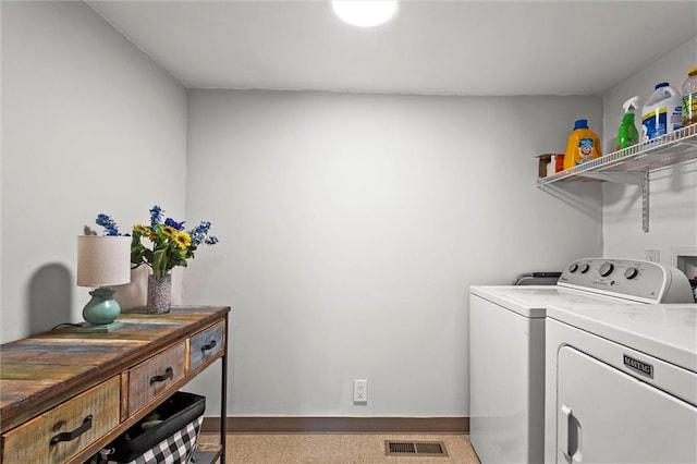 314 E Nichols St, Spring Hill, KS 66083 - laundry room featuring washer and dryer and baseboards