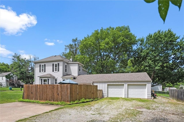 314 E Nichols St, Spring Hill, KS 66083 - view of front facade featuring driveway and an attached garage