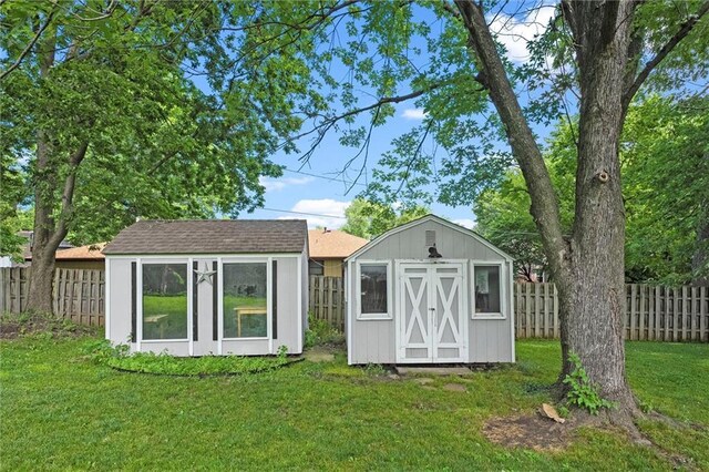 314 E Nichols St, Spring Hill, KS 66083 - view of shed with a fenced backyard