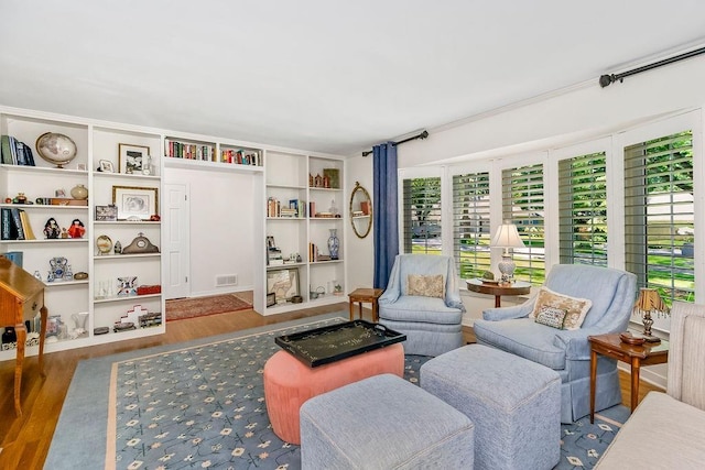 9201 Ensley Ln, Leawood, KS 66206 - living area with wood finished floors and built in features