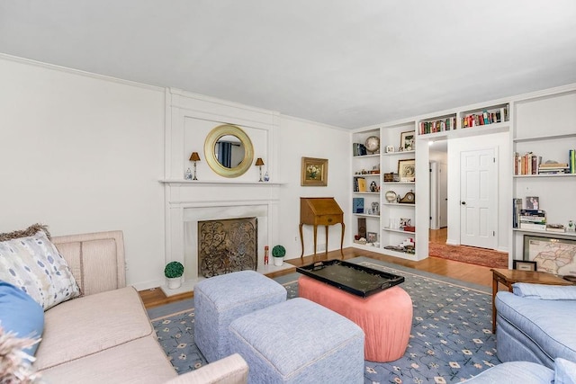 9201 Ensley Ln, Leawood, KS 66206 - living area with wood finished floors, built in features, and a large fireplace