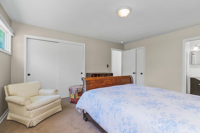 9201 Ensley Ln, Leawood, KS 66206 - carpeted bedroom featuring a closet and ensuite bath