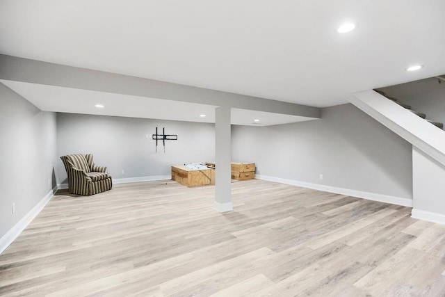 9201 Ensley Ln, Leawood, KS 66206 - finished basement featuring light wood finished floors, recessed lighting, and stairway