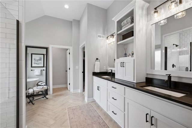 9260 Saddletop St, Lenexa, KS 66227 - full bathroom featuring double vanity, a shower stall, a freestanding tub, and high vaulted ceiling