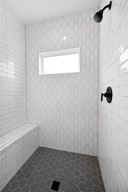 9260 Saddletop St, Lenexa, KS 66227 - bathroom with tiled shower and tile patterned flooring