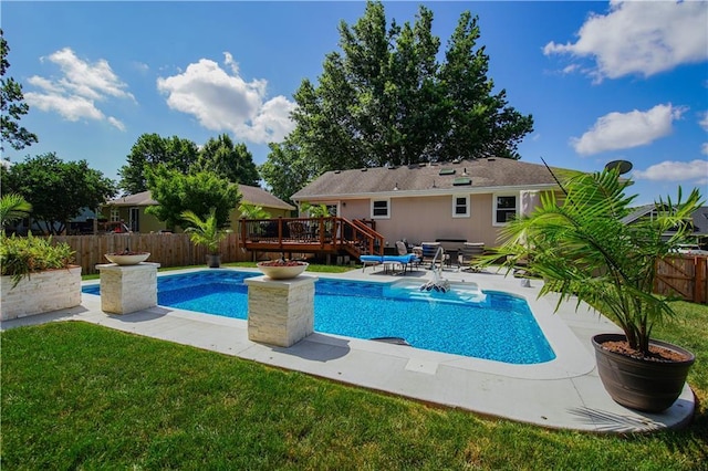1005 Hunters Rd, Blue Springs, MO 64014 - view of swimming pool with a wooden deck, a fenced backyard, and a patio