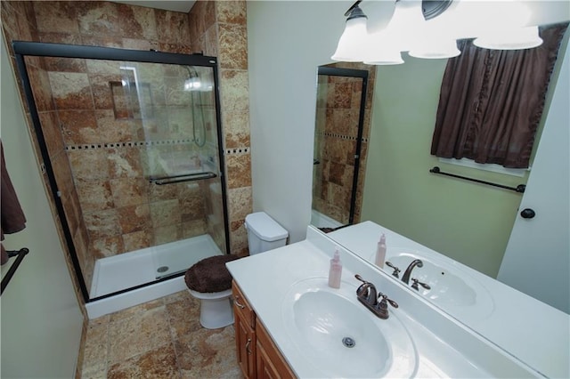 1005 Hunters Rd, Blue Springs, MO 64014 - full bathroom featuring vanity, a shower stall, and stone finish flooring