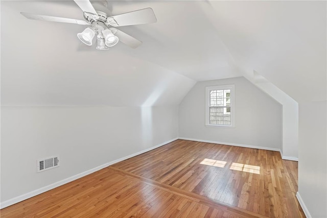 7712 Mcgee St, Kansas City, MO 64114 - bonus room with hardwood / wood-style flooring and vaulted ceiling