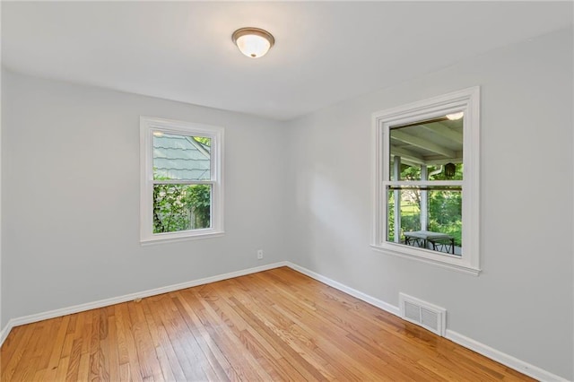 7712 Mcgee St, Kansas City, MO 64114 - spare room featuring baseboards and light wood-type flooring