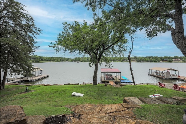 792 195th St, Fort Scott, KS 66701 - dock area with a water view and a lawn
