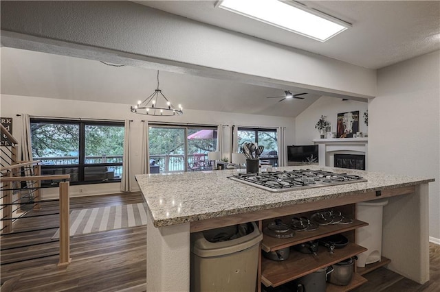 792 195th St, Fort Scott, KS 66701 - kitchen featuring stainless steel gas cooktop, dark wood-style flooring, plenty of natural light, and a chandelier